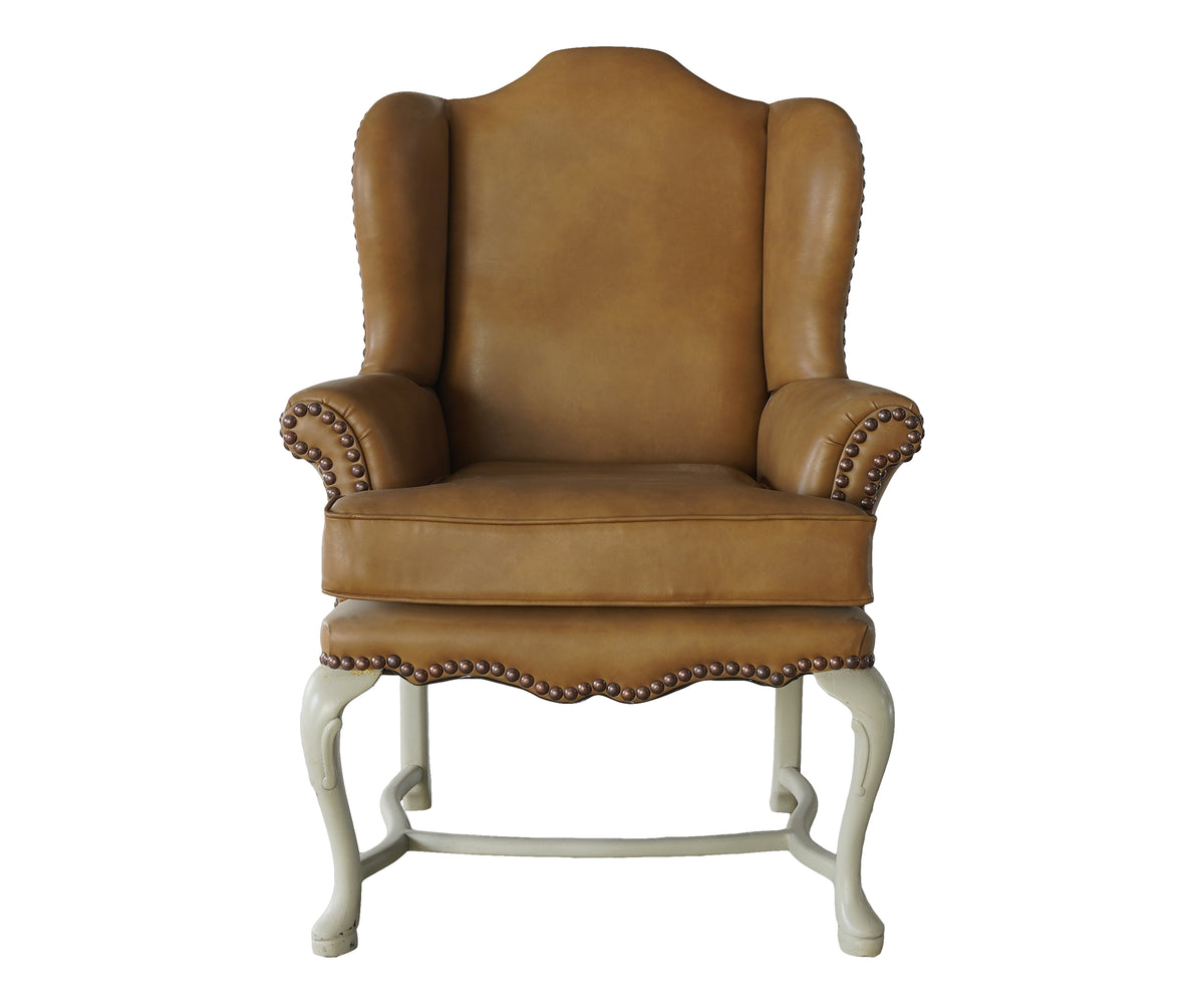 Tan Wingback Armchair with Cabriole Legs & Brasshead Trim