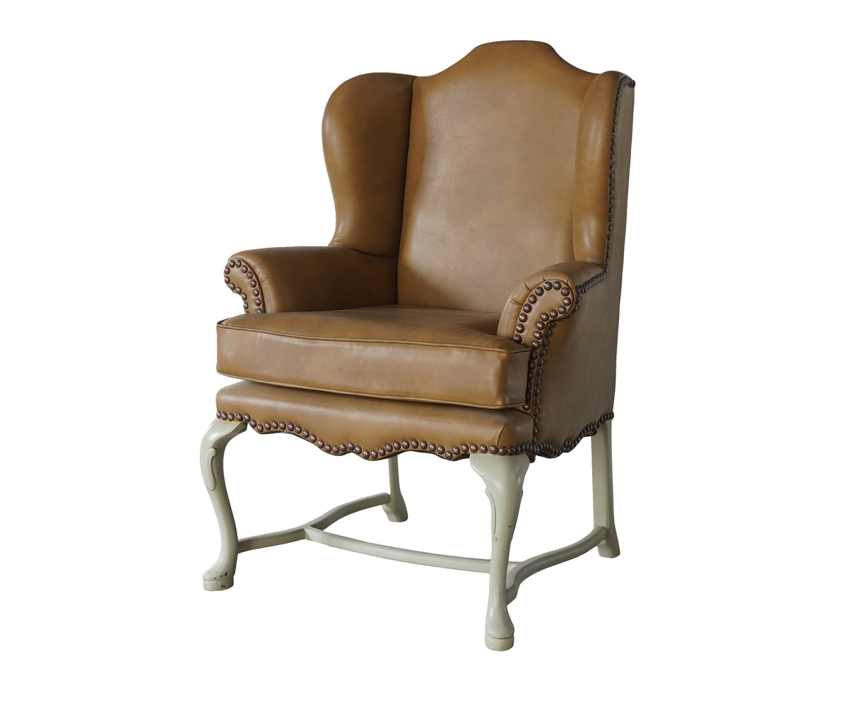 Tan Wingback Armchair with Cabriole Legs & Brasshead Trim
