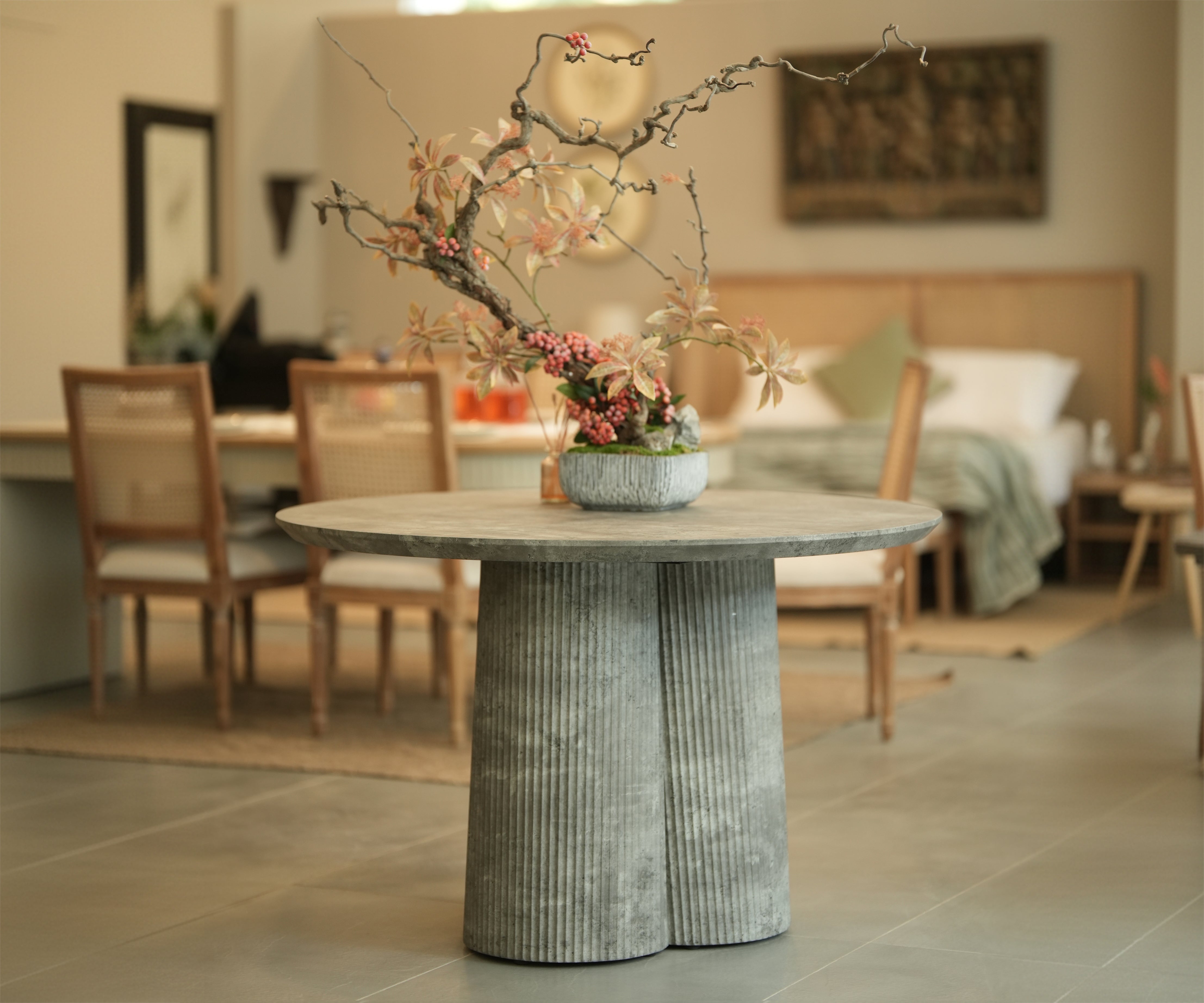 Round Dining Table with Stone Finish & Fluted Pedestal Base