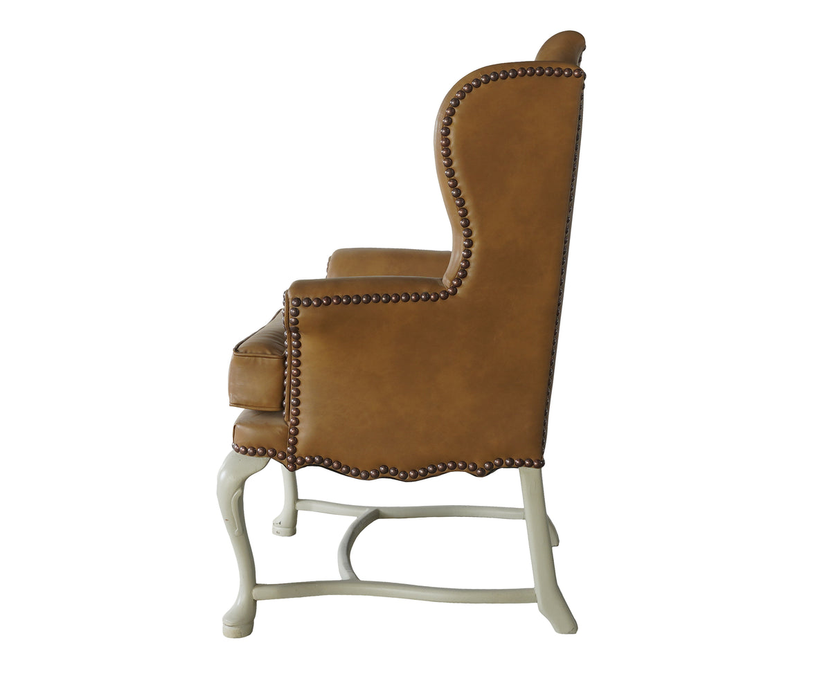 Tan Wingback Armchair with Cabriole Legs & Brasshead Trim